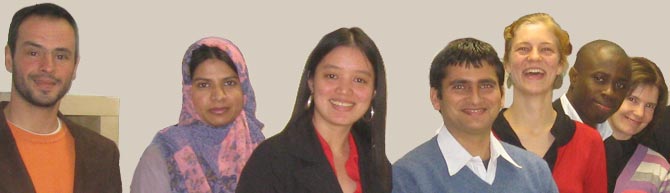 Students smiling at the camera in Lisbon classroom